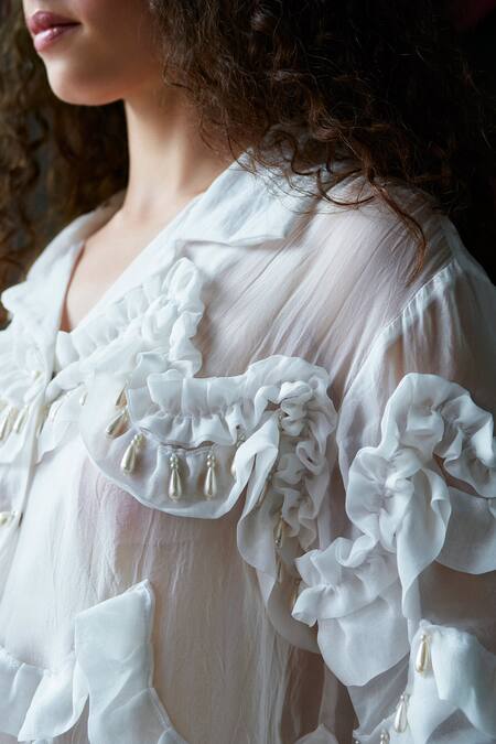 Therealb White Organza Pearls Collared Tassel Embellished Ruffled Blouse at Aza Fashions Therealb_White Organza Pearls Collared Tassel Embellished Ruffled Blouse _at_Aza_Fashions