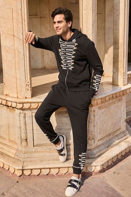 Dash And Dot Black Cotton Diamonds, Metallic Thread Dori Embroidered Hoodie And Jogger Set at Aza Fashions Dash And Dot_Black Cotton Diamonds, Metallic Thread Dori Embroidered Hoodie And Jogger Set _at_Aza_Fashions