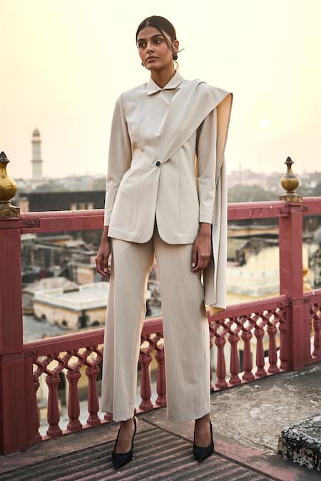 Shop Dash And Dot Ivory Polyester, Rayon, Spandex Pinstriped Straight Pant at Aza Fashions Shop_Dash And Dot_Ivory Polyester, Rayon, Spandex Pinstriped Straight Pant _at_Aza_Fashions