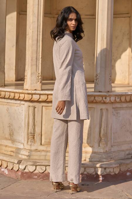 Shop Dash And Dot Beige Polyester Embroidery Bandeau Floral Overlapping Front Jacket And Pant Set at Aza Fashions Shop_Dash And Dot_Beige Polyester Embroidery Bandeau Floral Overlapping Front Jacket And Pant Set_at_Aza_Fashions