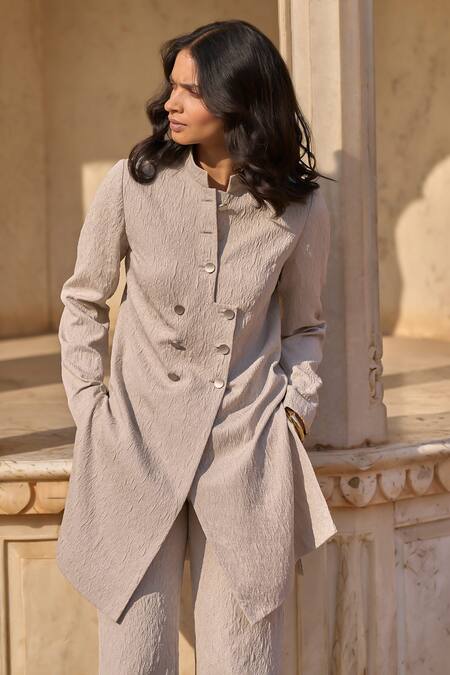 Dash And Dot Beige Polyester Embroidery Bandeau Floral Overlapping Front Jacket And Pant Set at Aza Fashions Dash And Dot_Beige Polyester Embroidery Bandeau Floral Overlapping Front Jacket And Pant Set_at_Aza_Fashions