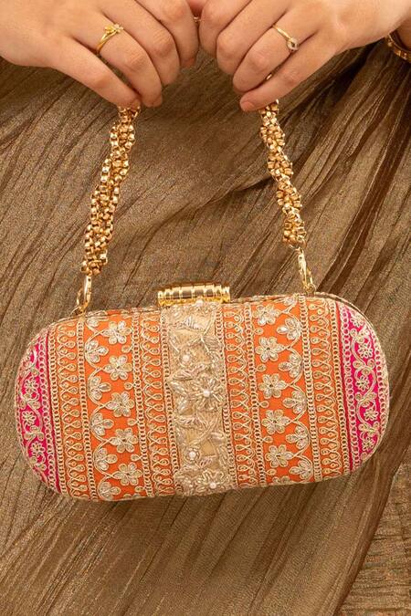 Shop Amyra Orange Lace Embellished Capsule Clutch at Aza Fashions Shop_Amyra_Orange Lace Embellished Capsule Clutch_at_Aza_Fashions