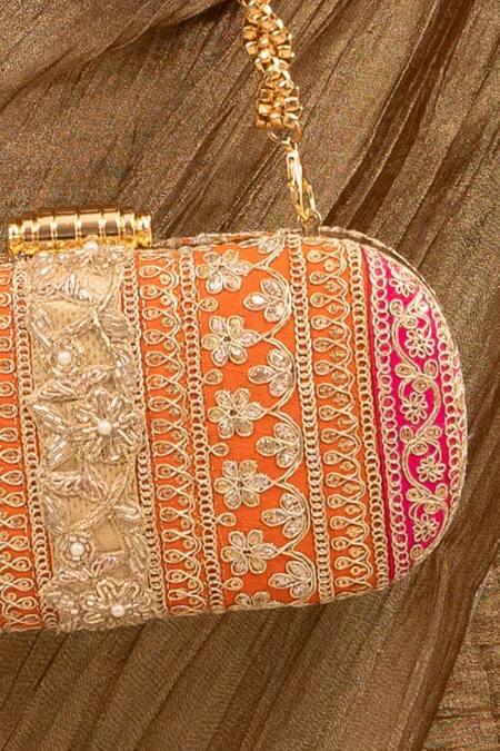 Buy Amyra Orange Lace Embellished Capsule Clutch Online at Aza Fashions Buy_Amyra_Orange Lace Embellished Capsule Clutch_Online_at_Aza_Fashions