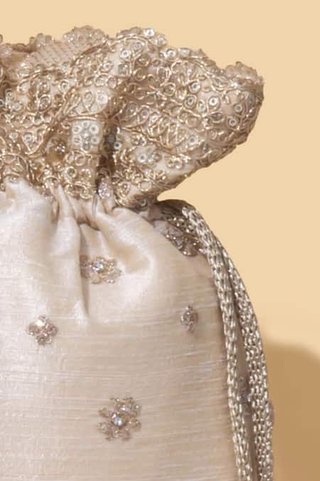 Amyra Beige Embroidery, Crystals Tassel Potli Bag Online at Aza Fashions Amyra_Beige Embroidery, Crystals Tassel Potli Bag_Online_at_Aza_Fashions
