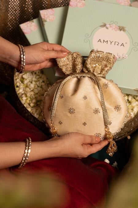 Buy Amyra Beige Embroidery, Crystals Tassel Potli Bag Buy_Amyra_Beige Embroidery, Crystals Tassel Potli Bag