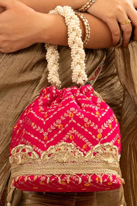 Shop Amyra Pink Lace, Pearls Bandhani Embellished Bucket Bag at Aza Fashions Shop_Amyra_Pink Lace, Pearls Bandhani Embellished Bucket Bag _at_Aza_Fashions