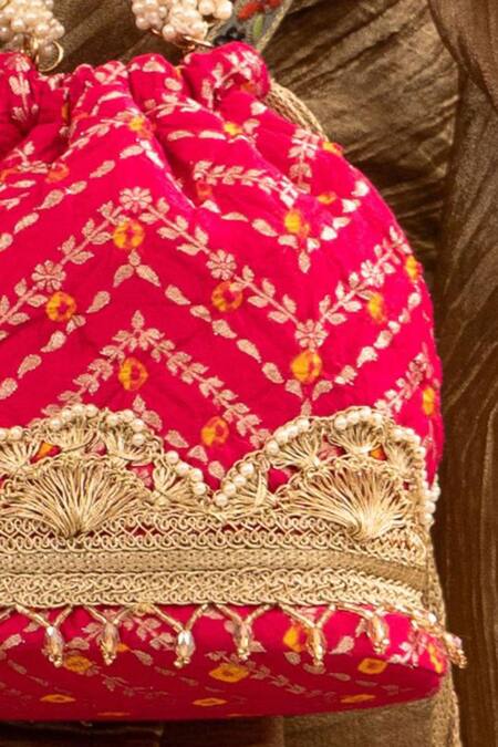 Amyra Pink Lace, Pearls Bandhani Embellished Bucket Bag Online at Aza Fashions Amyra_Pink Lace, Pearls Bandhani Embellished Bucket Bag _Online_at_Aza_Fashions