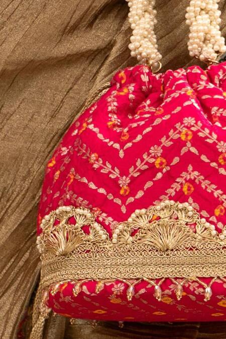 Shop Amyra Pink Lace, Pearls Bandhani Embellished Bucket Bag Online at Aza Fashions Shop_Amyra_Pink Lace, Pearls Bandhani Embellished Bucket Bag _Online_at_Aza_Fashions