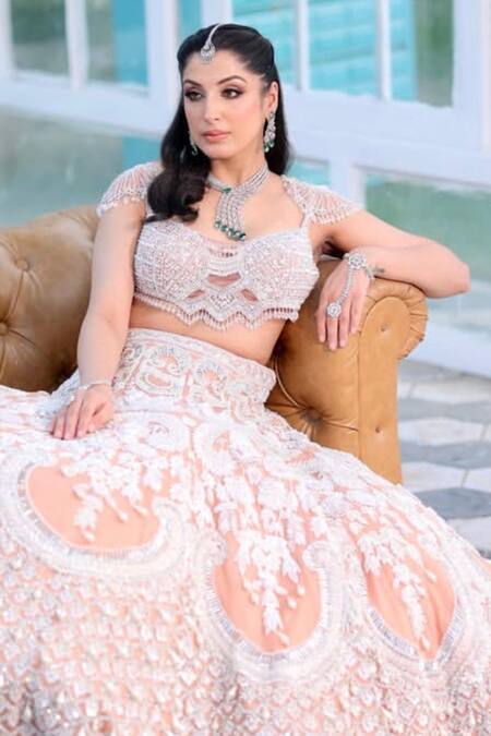 Buy_Kaynaat By Aanchal Sawhney_Peach Net Pearls, Crystals, Embroidery Sweetheart Neck Bridal Lehenga Set _Online_at_Aza_Fashions