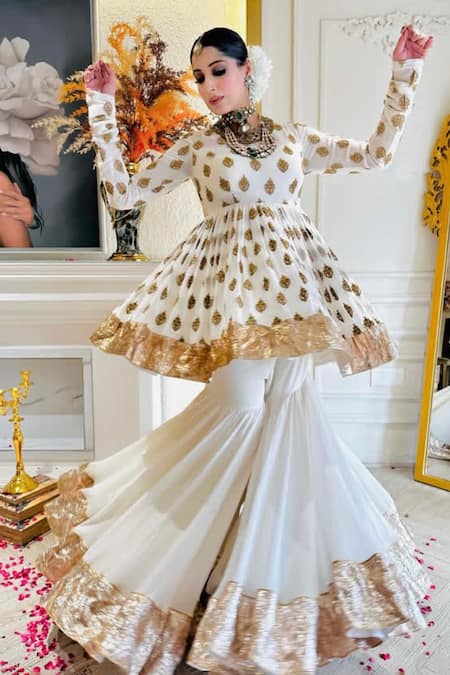 Kaynaat By Aanchal Sawhney_Ivory Georgette, Organza Sequins Round Floral Woven Peplum Anarkali Gharara Set _Online_at_Aza_Fashions