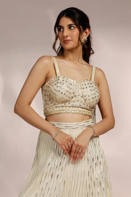 Shop Label Moni K Ivory Organza Sequins, Cut Work, Embroidery Sweetheart Hand Stripe Lehenga Set Online at Aza Fashions Shop_Label Moni K_Ivory Organza Sequins, Cut Work, Embroidery Sweetheart Hand Stripe Lehenga Set _Online_at_Aza_Fashions