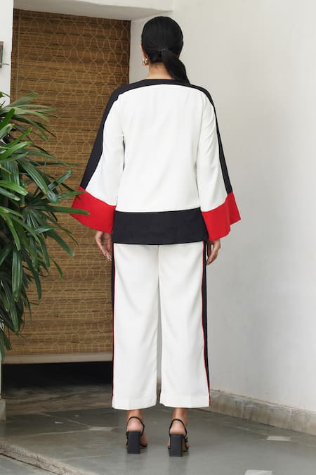 Shop_Keoo_Multi Color Crepe Round Neck Panelled Jacket Top And Flared Pant Set _at_Aza_Fashions