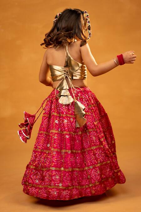 Shop JILMIL DREAMWEAR Gold , Chanderi Bandhani Print Lehenga And Halter Crop Top at Aza Fashions Shop_JILMIL DREAMWEAR_Gold , Chanderi Bandhani Print Lehenga And Halter Crop Top_at_Aza_Fashions