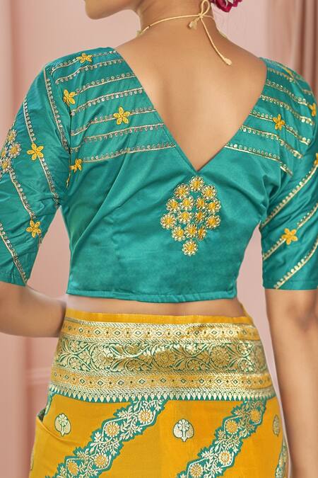 Naintara Bajaj Yellow Georgette, Silk Embroidery, Sequins Floral Woven Saree And Blouse Set at Aza Fashions Naintara Bajaj_Yellow Georgette, Silk Embroidery, Sequins Floral Woven Saree And Blouse Set_at_Aza_Fashions