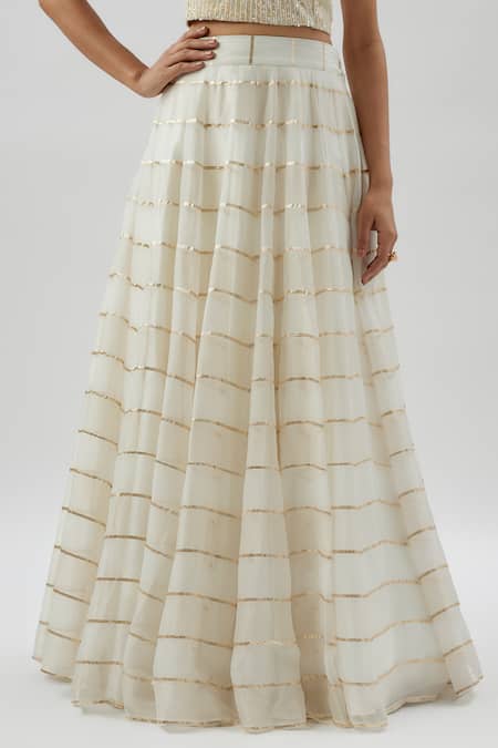 Buy_Divya Kanakia_Ivory Organza Sequins, Beads, Stripes Apsara Pattern Lehenga Corset Set _Online_at_Aza_Fashions