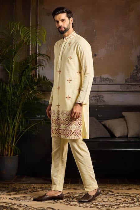 Shop Diyarajvvir Yellow Cotton, Silk Cut Work Floral Tribal Embroidered Kurta Set at Aza Fashions Shop_Diyarajvvir_Yellow Cotton, Silk Cut Work Floral Tribal Embroidered Kurta Set _at_Aza_Fashions