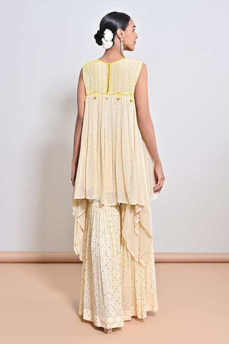 Shop Keith Gomes Beige Georgette Beads, Sequins Round Hand Embroidered Asymmetric Tunic And Gharara at Aza Fashions Shop_Keith Gomes_Beige Georgette Beads, Sequins Round Hand Embroidered Asymmetric Tunic And Gharara _at_Aza_Fashions