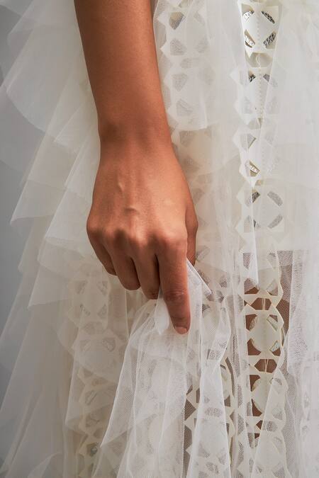 Deepika Arora_White Net Applique One Shoulder Asymmetric Top And Tiered Skirt Set _Online_at_Aza_Fashions