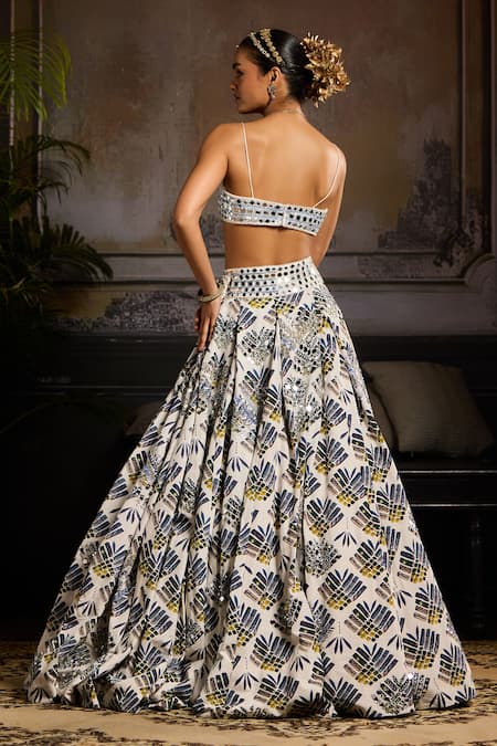 Shop Diyarajvvir Silver Satin, Lycra, Tulle, Crepe Mirrors, Sequins Butta Leaf Print Lehenga Set at Aza Fashions Shop_Diyarajvvir_Silver Satin, Lycra, Tulle, Crepe Mirrors, Sequins Butta Leaf Print Lehenga Set _at_Aza_Fashions