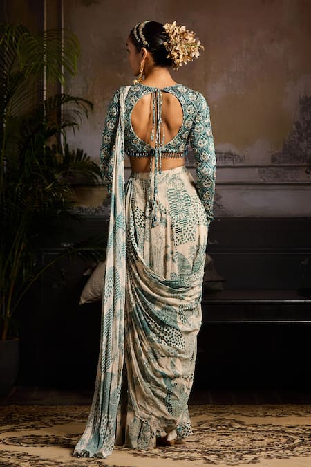 Shop Diyarajvvir Beige Crepe, Georgette, Lining Shantoon Print Pre-draped Saree With Blouse at Aza Fashions Shop_Diyarajvvir_Beige Crepe, Georgette, Lining Shantoon Print Pre-draped Saree With Blouse _at_Aza_Fashions