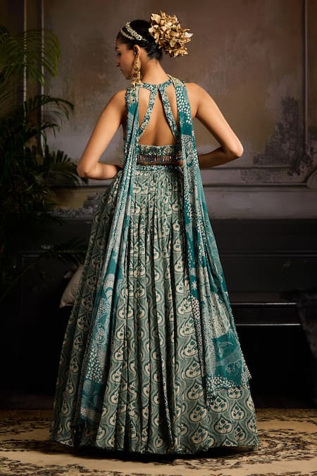 Shop Diyarajvvir Green Organza, Crepe Embroidery, Beads Halter Neck Crest Jaal Print Lehenga Set at Aza Fashions Shop_Diyarajvvir_Green Organza, Crepe Embroidery, Beads Halter Neck Crest Jaal Print Lehenga Set _at_Aza_Fashions