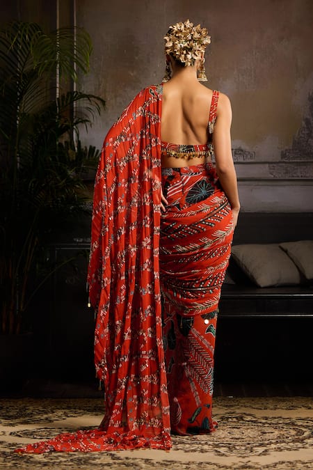 Shop Diyarajvvir Orange Georgette Beads, Cut Work, Sequins Leaf Print Draped Skirt Saree And Blouse at Aza Fashions Shop_Diyarajvvir_Orange Georgette Beads, Cut Work, Sequins Leaf Print Draped Skirt Saree And Blouse _at_Aza_Fashions