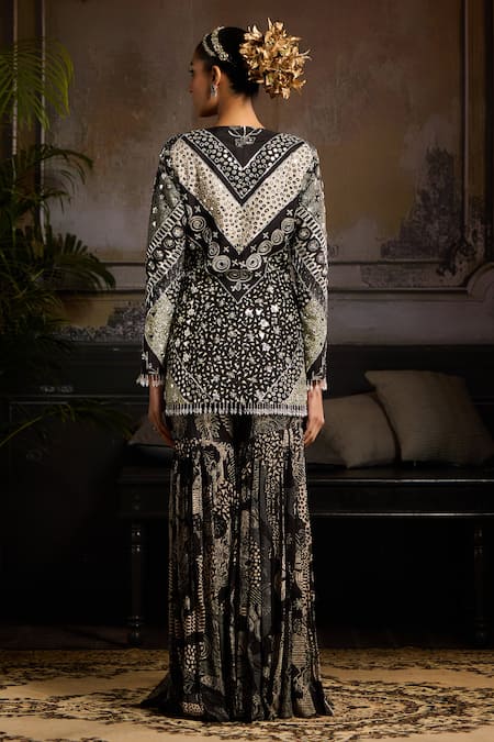 Shop Diyarajvvir Black Raw Silk, Georgette, Lining Shantoon Crystal, Print Jacket With Gharara at Aza Fashions Shop_Diyarajvvir_Black Raw Silk, Georgette, Lining Shantoon Crystal, Print Jacket With Gharara _at_Aza_Fashions