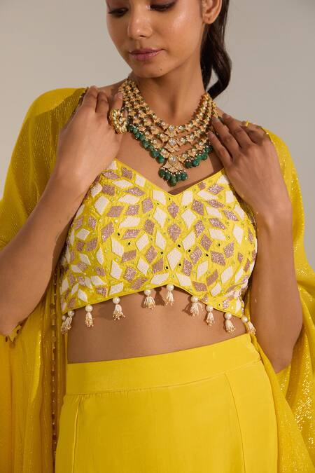 Nitisha Kashyap Official_Yellow Silk, Crepe, Lurex Georgette Bead, Stripe Pattern Draped Skirt Set _Online_at_Aza_Fashions