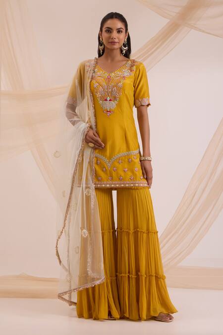 Shop_Nitisha Kashyap Official_Yellow Silk, Net, Georgette Resham, Paisley Embroidered Kurta Gharara Set _Online_at_Aza_Fashions