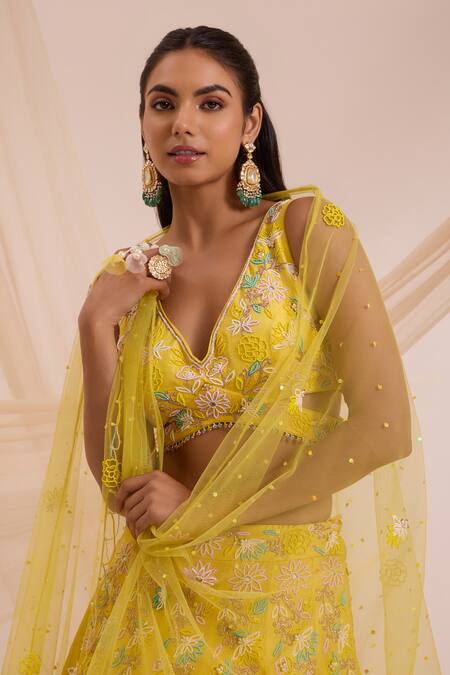 Shop_Nitisha Kashyap Official_Yellow Silk, Net Embroidery, Beads V-neck Floral Lehenga Set _Online_at_Aza_Fashions