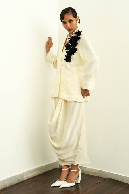 OFRIDA Ivory Silk Applique V-neck 3d Rose Jacket And Draped Skirt Set Online at Aza Fashions OFRIDA_Ivory Silk Applique V-neck 3d Rose Jacket And Draped Skirt Set_Online_at_Aza_Fashions