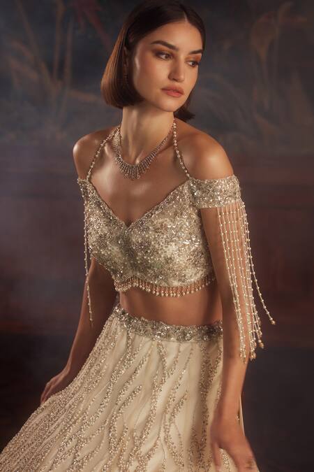 Roqa_Ivory Net Sequins, Beads, Pearls, Embroidery Sweetheart Neck Hand Lehenga Set _at_Aza_Fashions