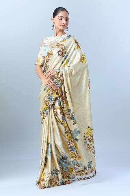 Anamika Khanna Beige Floral, Sequin, Tassel, Bead Round Print Saree With Blouse at Aza Fashions Anamika Khanna_Beige Floral, Sequin, Tassel, Bead Round Print Saree With Blouse _at_Aza_Fashions