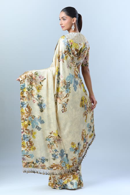 Shop Anamika Khanna Beige Floral, Sequin, Tassel, Bead Round Print Saree With Blouse at Aza Fashions Shop_Anamika Khanna_Beige Floral, Sequin, Tassel, Bead Round Print Saree With Blouse _at_Aza_Fashions