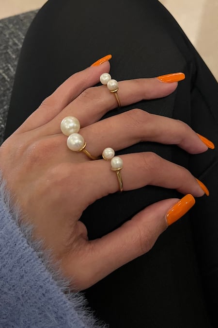 Buy Anaash White Pearls Gold Plated Embellished Ring Set Online at Aza Fashions Buy_Anaash_White Pearls Gold Plated Embellished Ring Set _Online_at_Aza_Fashions