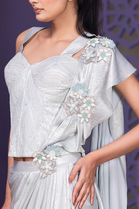 Nidhi Kejriwal Blue Georgette, Satin, Silk Sequins, Bloom Pre-draped Saree And Corset Blouse at Aza Fashions Nidhi Kejriwal_Blue Georgette, Satin, Silk Sequins, Bloom Pre-draped Saree And Corset Blouse _at_Aza_Fashions