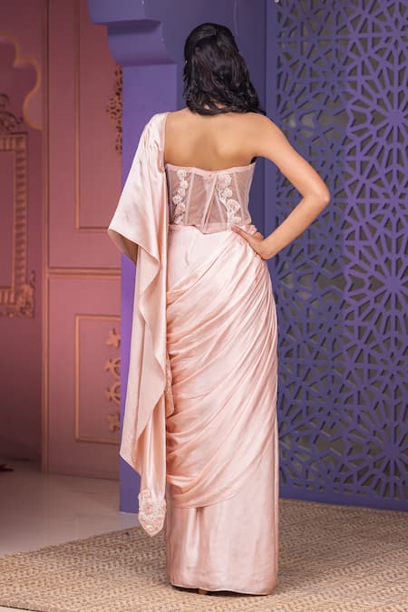 Shop Nidhi Kejriwal Pink Net, Satin Crystals, Cut Work, Blossom Applique Pre-draped Saree Set at Aza Fashions Shop_Nidhi Kejriwal_Pink Net, Satin Crystals, Cut Work, Blossom Applique Pre-draped Saree Set _at_Aza_Fashions