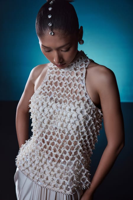Istya_Ivory Net, Satin Pearls, Sequins, Beads Halter Embroidered Top Draped Skirt Set _Online_at_Aza_Fashions