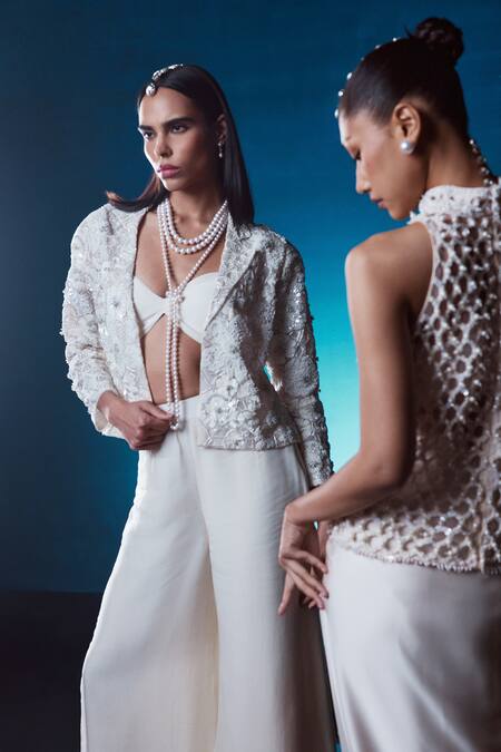 Istya_Ivory Organza Pearls, Sequins, Cut Work Floral Embroidered Jacket Pant Set _at_Aza_Fashions