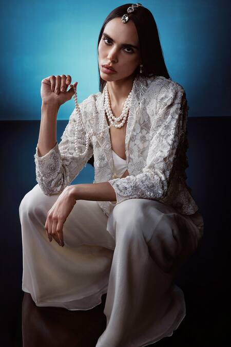 Buy_Istya_Ivory Organza Pearls, Sequins, Cut Work Floral Embroidered Jacket Pant Set 