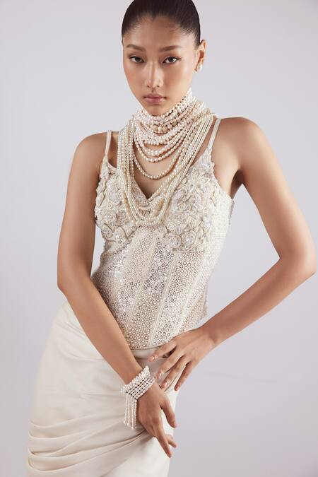 Shop_Istya_Ivory Net, Satin Geometric, Pearls, Embroidered Corset With Draped Skirt _Online_at_Aza_Fashions
