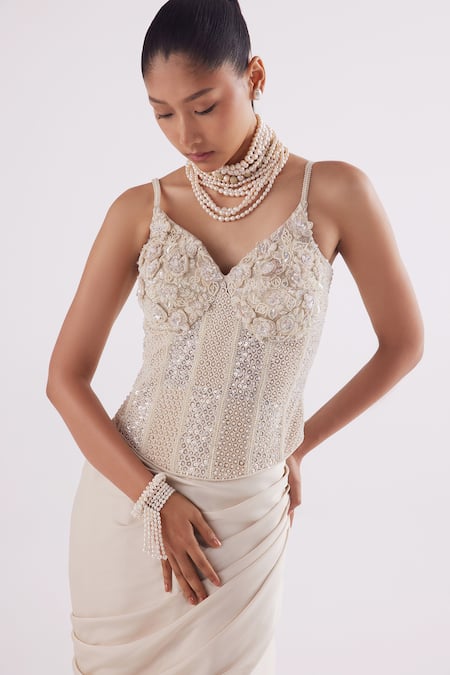 Istya_Ivory Net, Satin Geometric, Pearls, Embroidered Corset With Draped Skirt _Online_at_Aza_Fashions