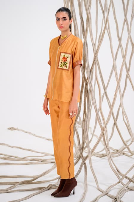 The Dramebaaz Co Beige Chanderi Leather Framed Rose V Embroidered Shirt And Trouser Set