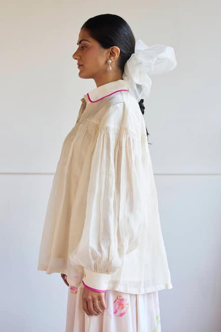 Juanita By Shubhda Ivory Chanderi Collared Smocked Detail Balloon Sleeve Shirt Online at Aza Fashions Juanita By Shubhda_Ivory Chanderi Collared Smocked Detail Balloon Sleeve Shirt _Online_at_Aza_Fashions