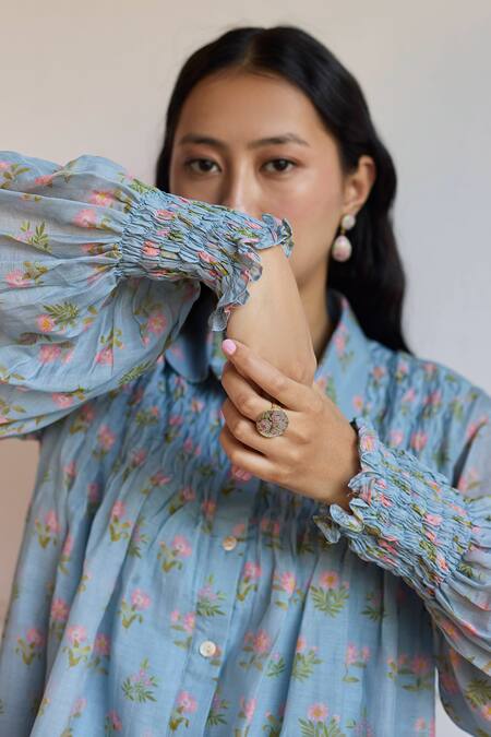 Juanita By Shubhda Blue Chanderi Collared Floral Print Smocked Shirt Online at Aza Fashions Juanita By Shubhda_Blue Chanderi Collared Floral Print Smocked Shirt _Online_at_Aza_Fashions