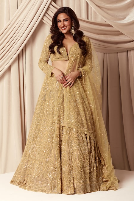 Seema Gujral Gold Net Embroidered Pearls Deep V Neck And Beads Work Bridal Lehenga Set 