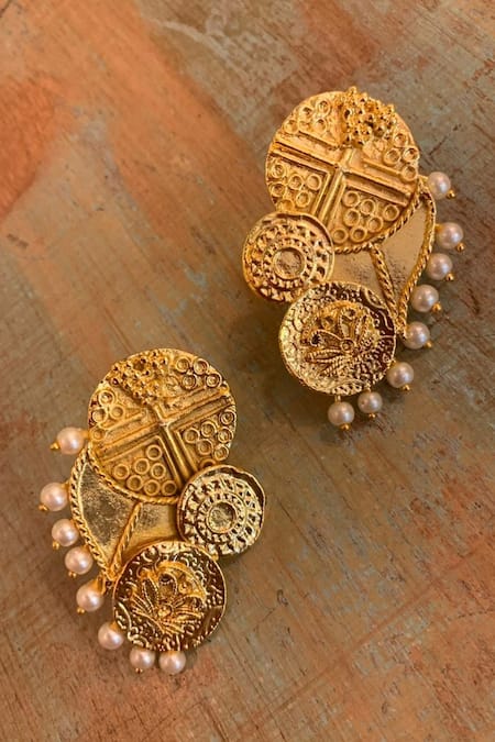 Shop Hetal Shah Gold Plated Carved Coin Earrings at Aza Fashions Shop_Hetal Shah_Gold Plated Carved Coin Earrings _at_Aza_Fashions
