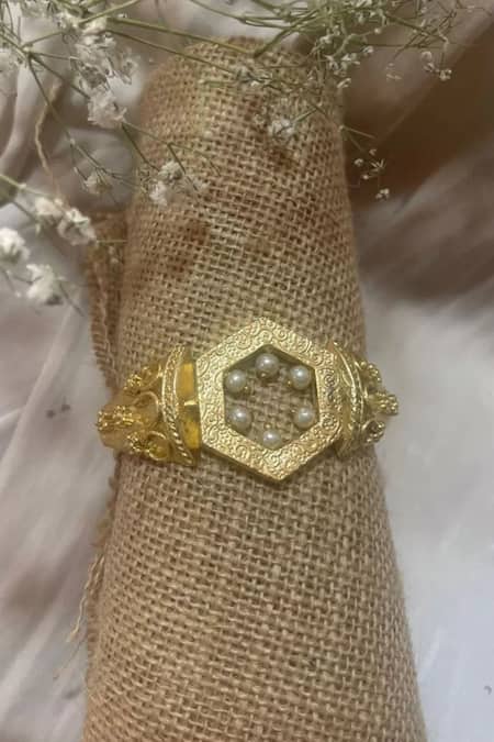 Shop Hetal Shah Gold Plated Pearls Embellished Hexagon Bracelet at Aza Fashions Shop_Hetal Shah_Gold Plated Pearls Embellished Hexagon Bracelet _at_Aza_Fashions
