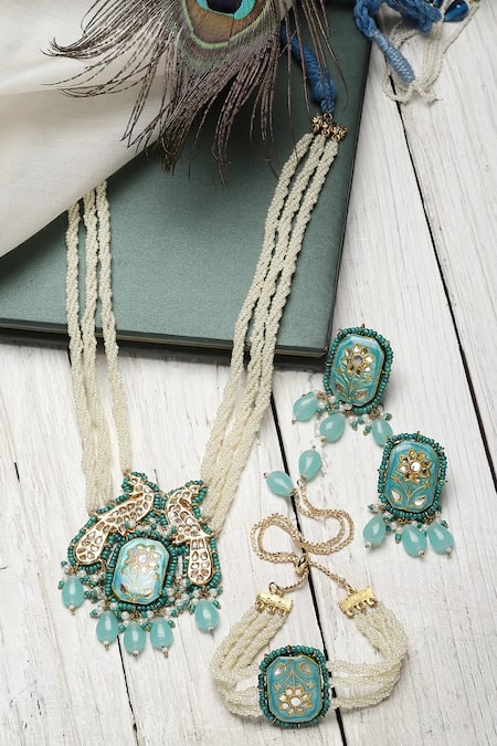 Shop Dugran By Dugristyle Gold Plated Pearls, Stones Peacock Pendant Necklace Set at Aza Fashions Shop_Dugran By Dugristyle_Gold Plated Pearls, Stones Peacock Pendant Necklace Set _at_Aza_Fashions