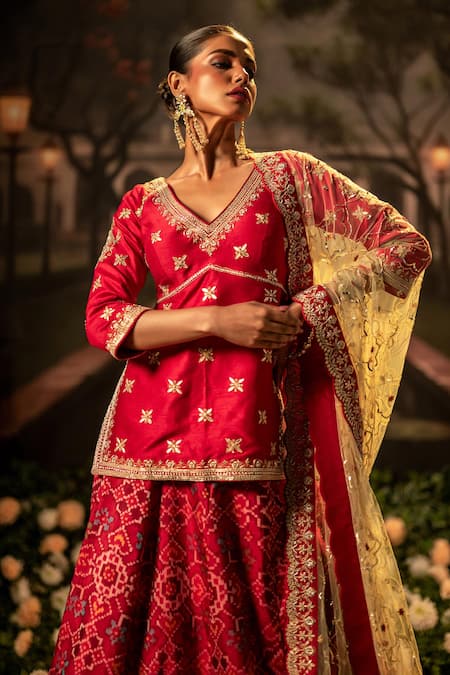 Bandhani_Red Silk Beads, Gota Patti, Lace V-neck Patola Embroidered Lehenga Kurta Set _Online_at_Aza_Fashions